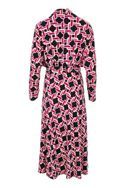 Product shot of the Rovel Dolman Dress in colour Magenta, from the back