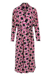 Product shot of the Rovel Dolman Dress in colour Magenta, from the front