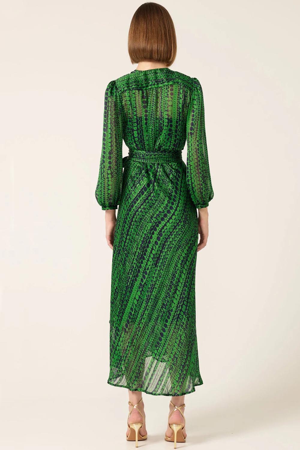 A model wearing the Savoir Midi Wrap Dress in colour Green (Green), from the back