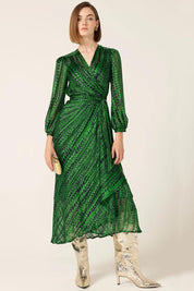 A model wearing the Savoir Midi Wrap Dress in colour Green (Green), from the front, showing the whole outfit