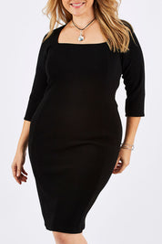 Model Ljubenka wearing size 16 of the Iris 3/4 Sleeve Dress in colour Black (Black), from the front, cropped image