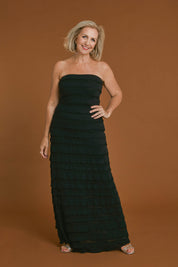 Model Sandy wearing size 10 of the Maddison Maxi Ruffle Dress in colour Black (Black), from the front, showing the whole outfit