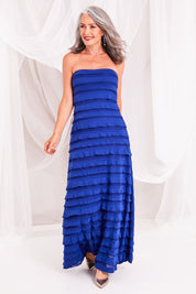 Model Luisa wearing size 10 of the Maddison Maxi Ruffle Dress in colour Sapphire (Blue), from the front, showing the whole outfit