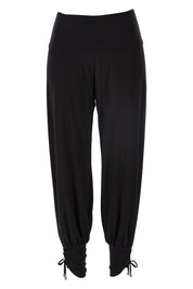 Product shot of the Harem Pant in colour Black (Black), from the front