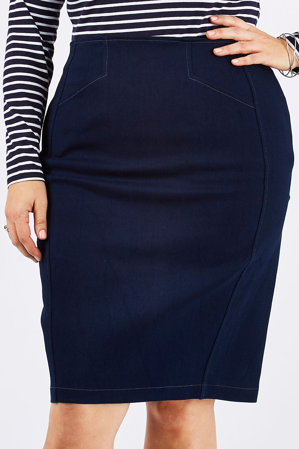 Model Ljubenka wearing size 16 of the Denim Skirt in colour IndigoDen (Blue), from the front, cropped image