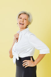 Model Elise wearing size 10 of the Classic Shirt in colour White (White), from the front, showing the whole outfit