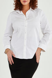Model Maddy wearing size 16 of the Classic Shirt in colour White (White), from the front, cropped image