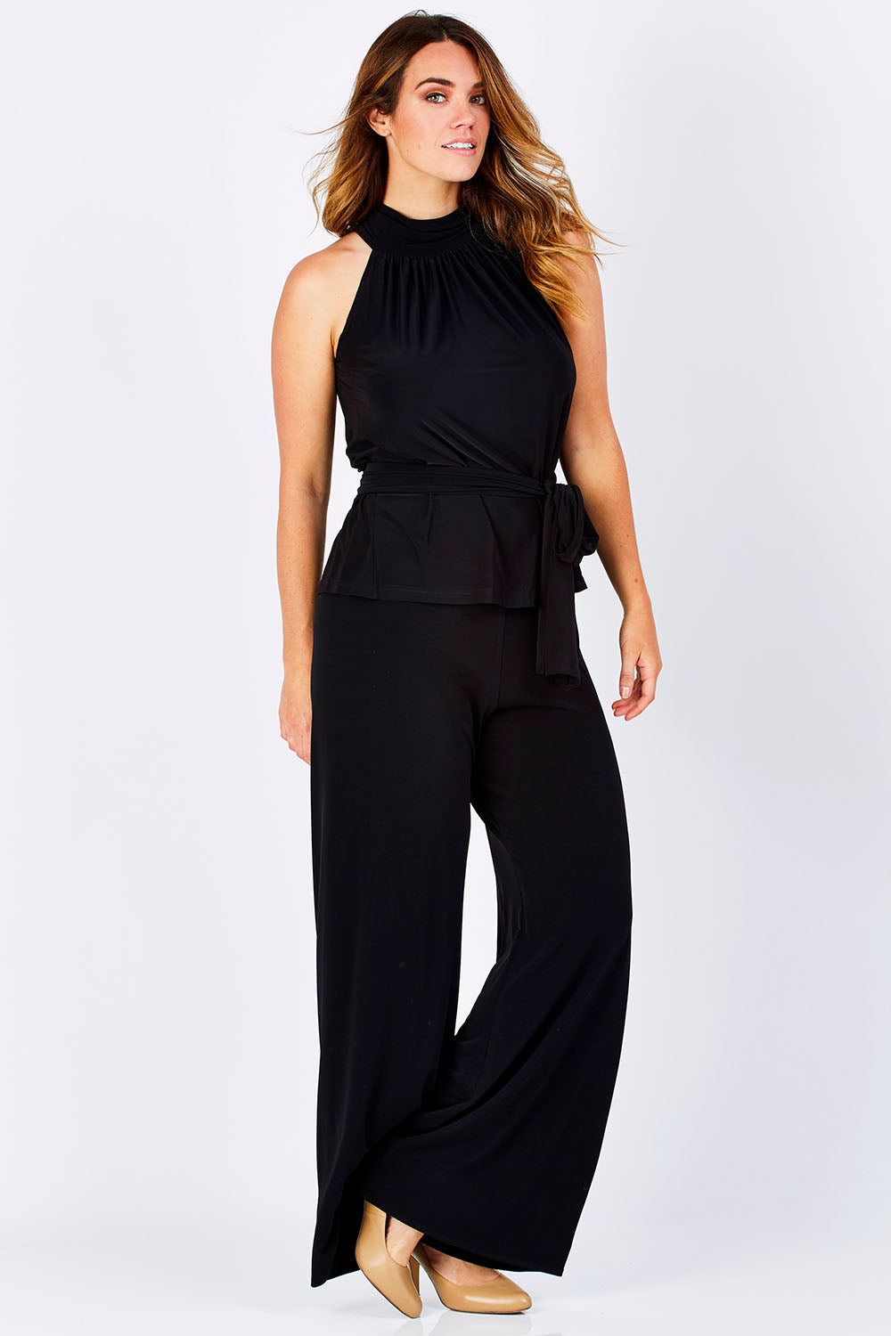 Model Laura wearing size 12 of the High Neck Tie Top in colour Black (Black), from the front, showing the whole outfit