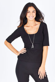 Model Gemma wearing size 10 of the 3/4 Sleeve Top in colour Black (Black), from the front, cropped image