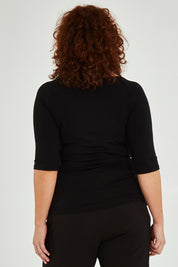 Model Maddy wearing size 16 of the 3/4 Sleeve Top in colour Black (Black), from the back