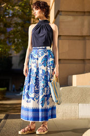 A model wearing the Yacht Party Skirt in colour Messina (Blue), from the front, showing the whole outfit