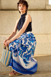 A model wearing the Yacht Party Skirt in colour Messina (Blue), from the front, showing the whole outfit