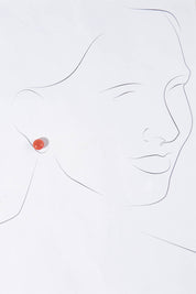 A model wearing size OneSize of the Medium Glass Stud Earrings in colour Coralgold, from the front, showing the whole outfit