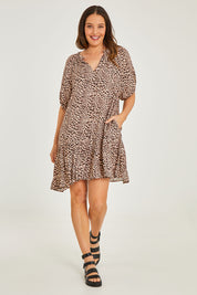 Model Georgia wearing size 10 of the Camilla Dress in colour Animal (Black), from the front, showing the whole outfit