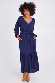 Model Olivia wearing size 10 of the Brigitte Balloon Sleeve Maxi Dress in colour Navy (Blue), from the front, showing the whole outfit