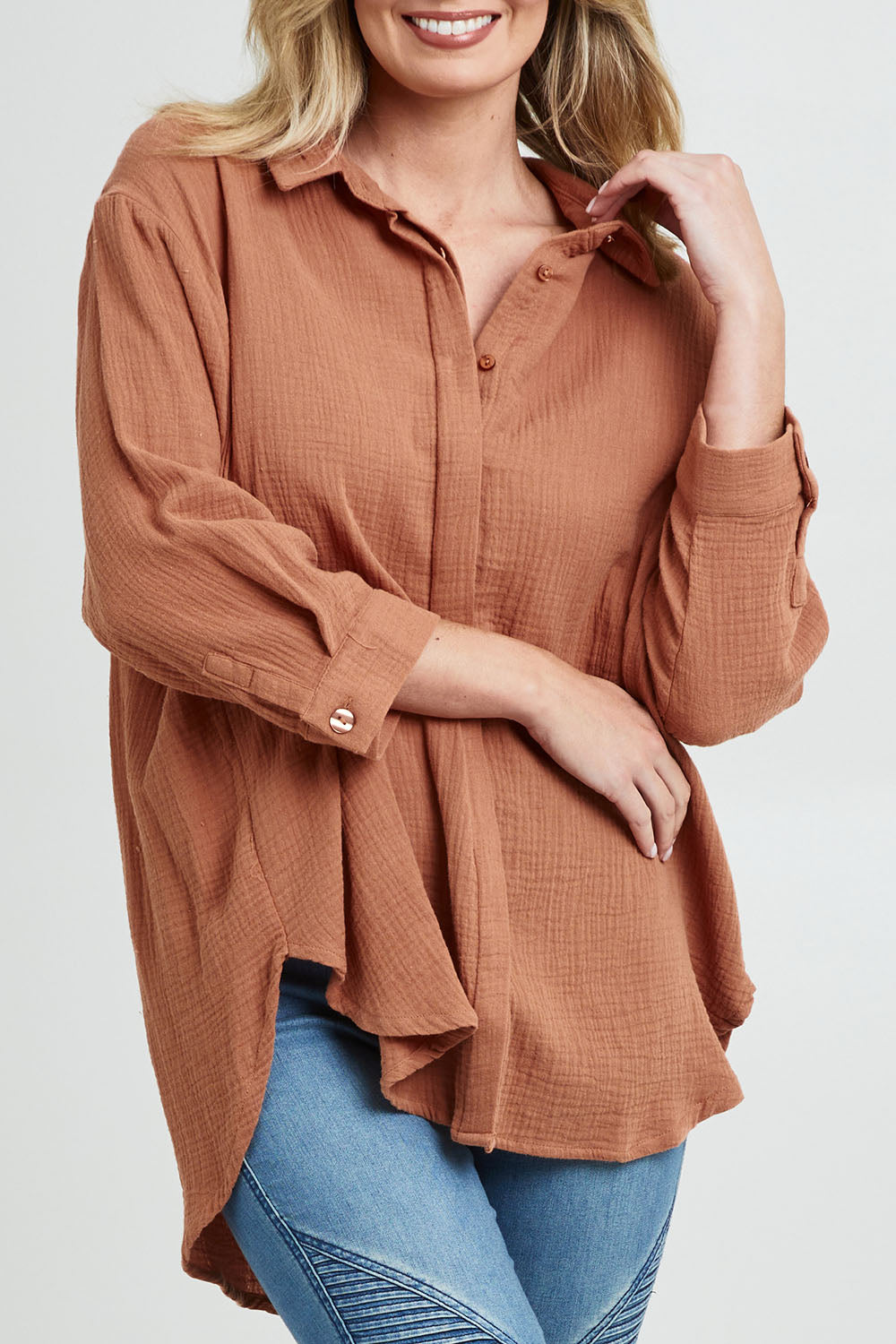 Model Grace wearing size 10 of the Felix Oversized Shirt in colour Mocha, from the front, cropped image