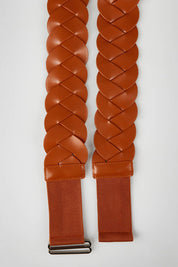 A model wearing the Koko Lattice Belt in colour Tan, from the front, showing the whole outfit