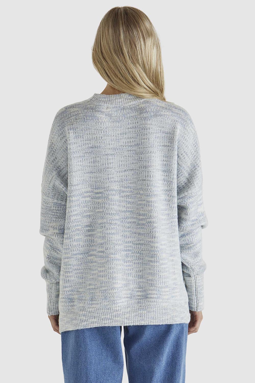 A model wearing the Kirsha Jumper in colour Bluemarle (Blue), from the back