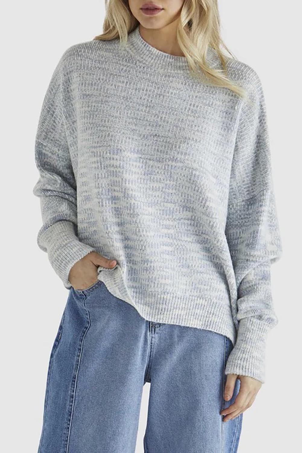A model wearing the Kirsha Jumper in colour Bluemarle (Blue), from the front, cropped image