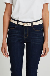 Model Madeline wearing the Seema Belt 3 Pack in colour Blushblue (Pink), from the front, cropped image