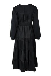 Product shot of the Charity Tiered Midi Dress in colour Black (Black), from the back