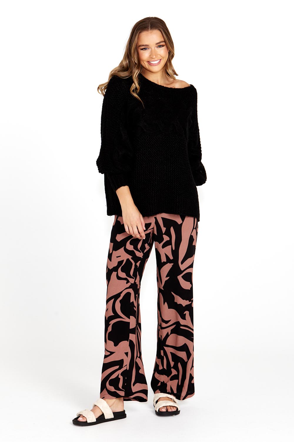 A model wearing the Joelle Wide Leg Pant in colour Abstract, from the front, showing the whole outfit