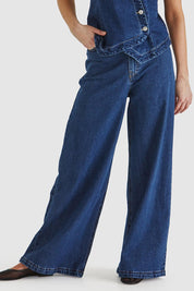 A model wearing the Marza Jean in colour 78Wash (Blue), from the front, cropped image