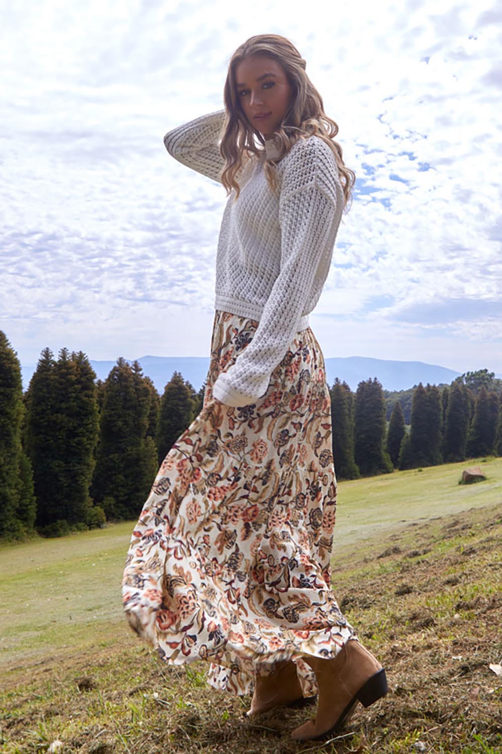 A model wearing the Dara Boho Skirt in colour Wildflower, from the front, showing the whole outfit