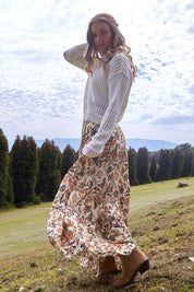 A model wearing the Dara Boho Skirt in colour Wildflower, from the front, showing the whole outfit