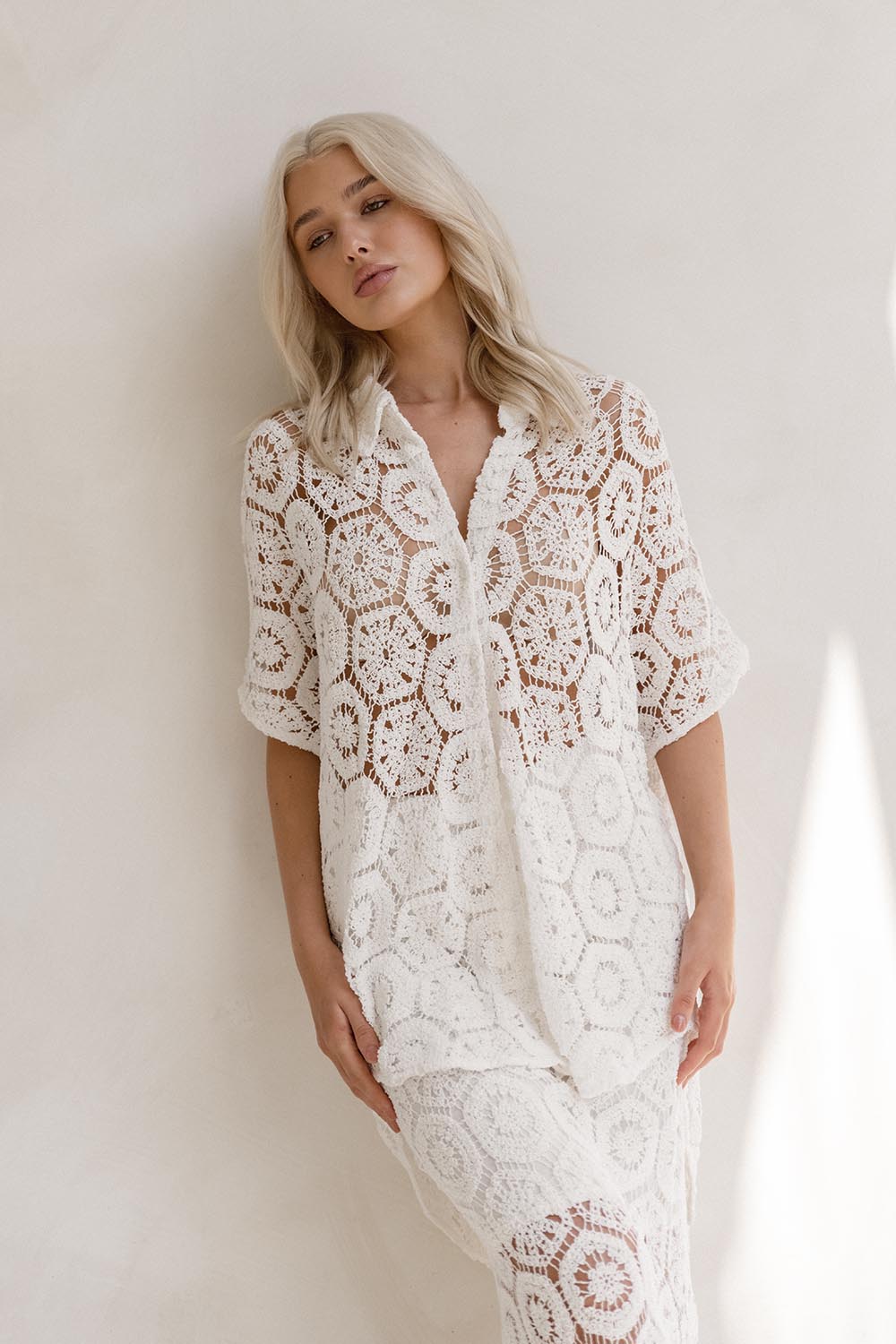 A model wearing the Clover Lace Cotton Shirt in colour White (White), from the front, showing the whole outfit