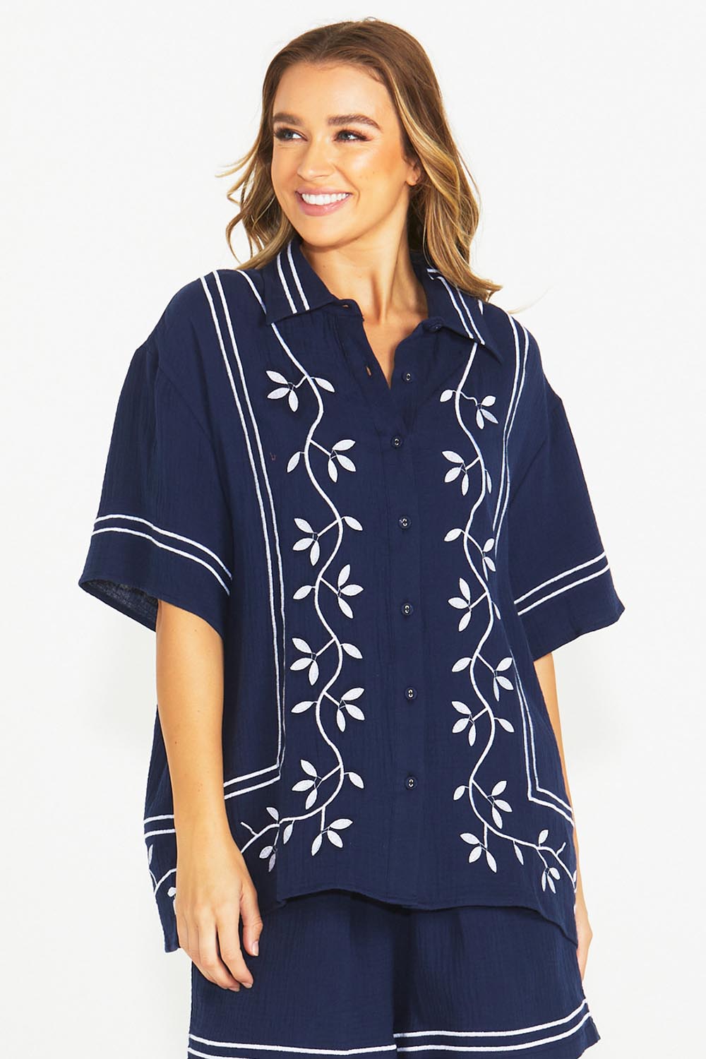 A model wearing the Jayden Cotton Short Sleeve Shirt in colour Navy (Blue), from the front, cropped image