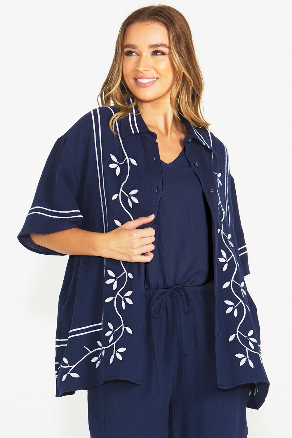 A model wearing the Jayden Cotton Short Sleeve Shirt in colour Navy (Blue), from the front, cropped image
