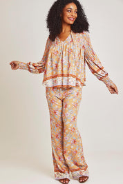 Model Ziara wearing size 10 of the Margie Top in colour Paisley, from the front, showing the whole outfit