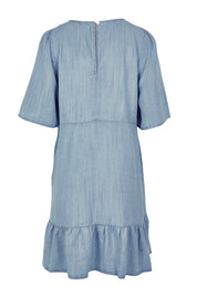 Product shot of the Rye Lyocell Dress in colour Chambray (Blue), from the back