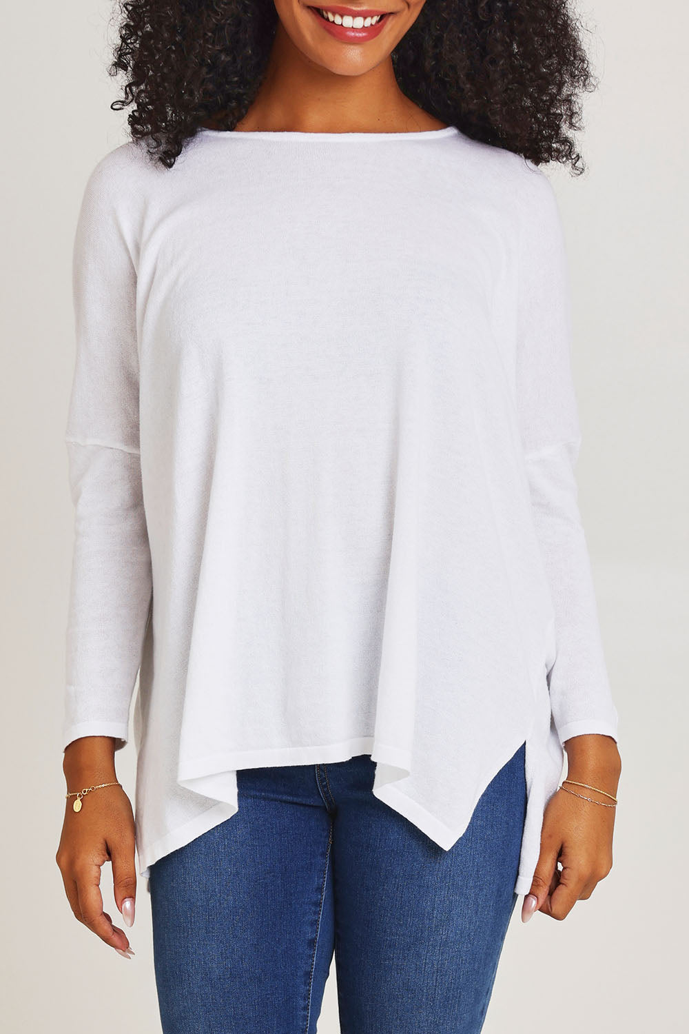 Model Ziara wearing size 10 of the Khaleesi Cotton Knit Top in colour White (White), from the front, cropped image