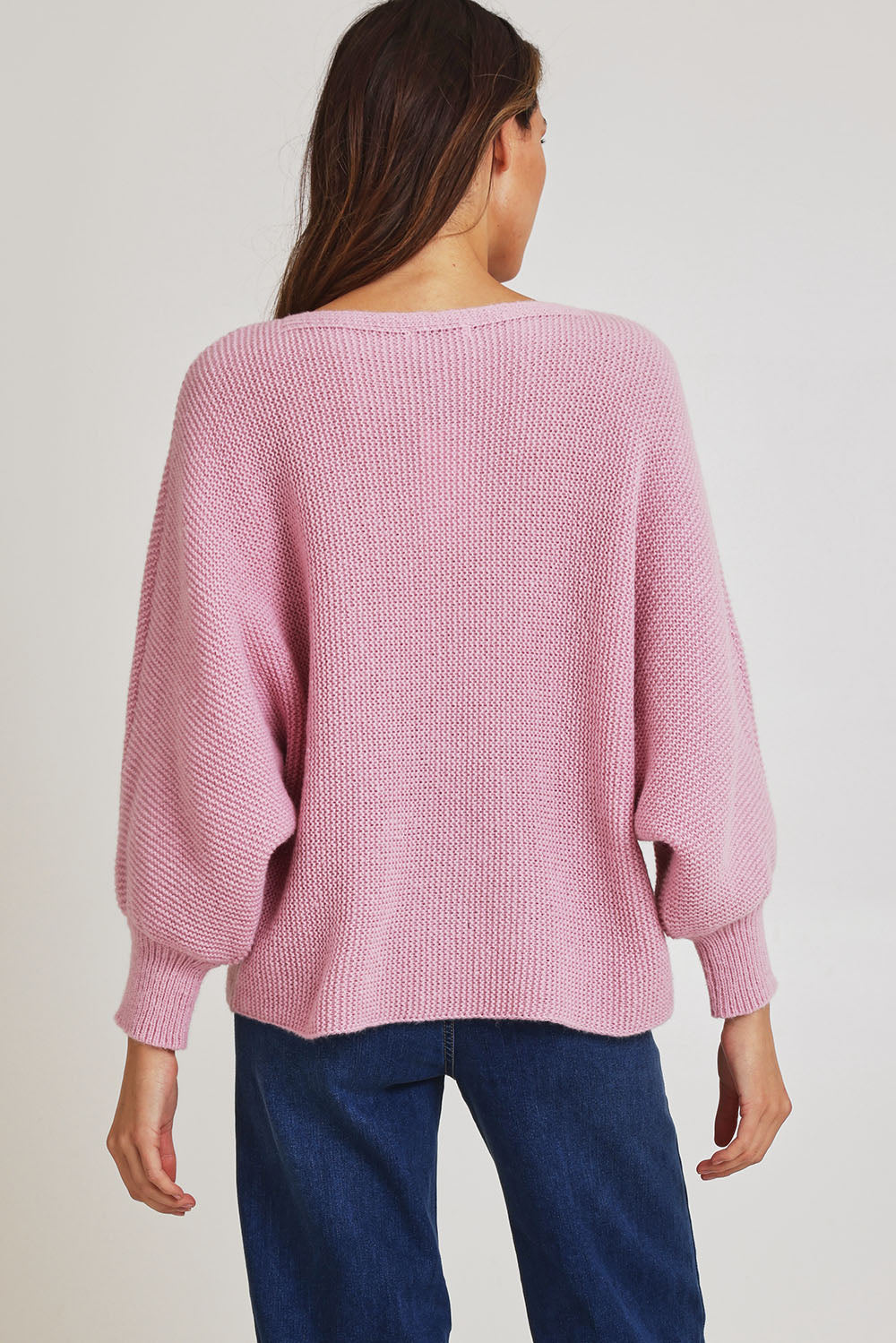 Model Madeline wearing size 10 of the Concord Cotton Blend Knit in colour Pink (Pink), from the back