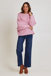 Model Madeline wearing size 10 of the Concord Cotton Blend Knit in colour Pink (Pink), from the front, showing the whole outfit