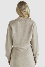A model wearing the Baldwin Cotton Blend Knit Jacket in colour Oatmeal, from the back