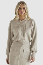A model wearing the Baldwin Cotton Blend Knit Jacket in colour Oatmeal, from the front, cropped image