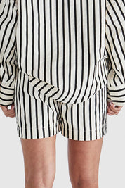 A model wearing the Rohan Cotton Short in colour Stripe, from the back