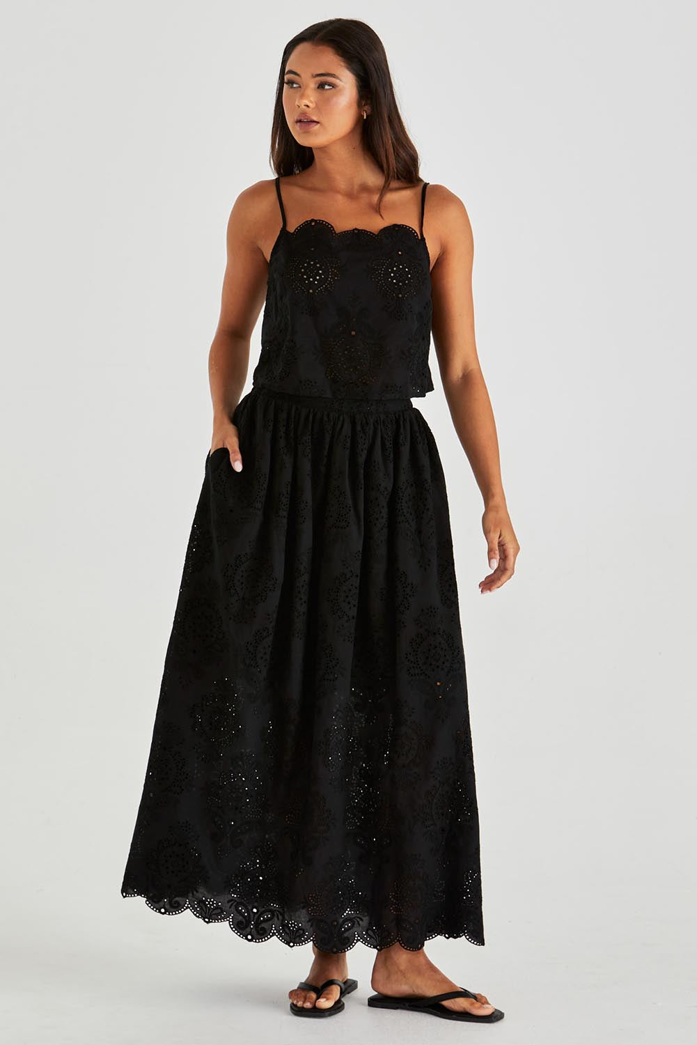 A model wearing the Ani  Cotton Full Skirt in colour Black (Black), from the front, showing the whole outfit