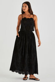A model wearing the Ani  Cotton Full Skirt in colour Black (Black), from the front, showing the whole outfit