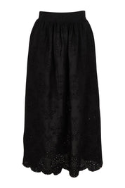 Product shot of the Ani  Cotton Full Skirt in colour Black (Black), from the front
