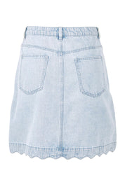 Product shot of the Vale Scalloped Denim Skirt in colour Bleach (Blue), from the back