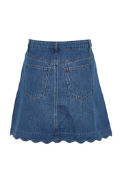 Product shot of the Vale Scalloped Denim Skirt in colour Midblue (Blue), from the back