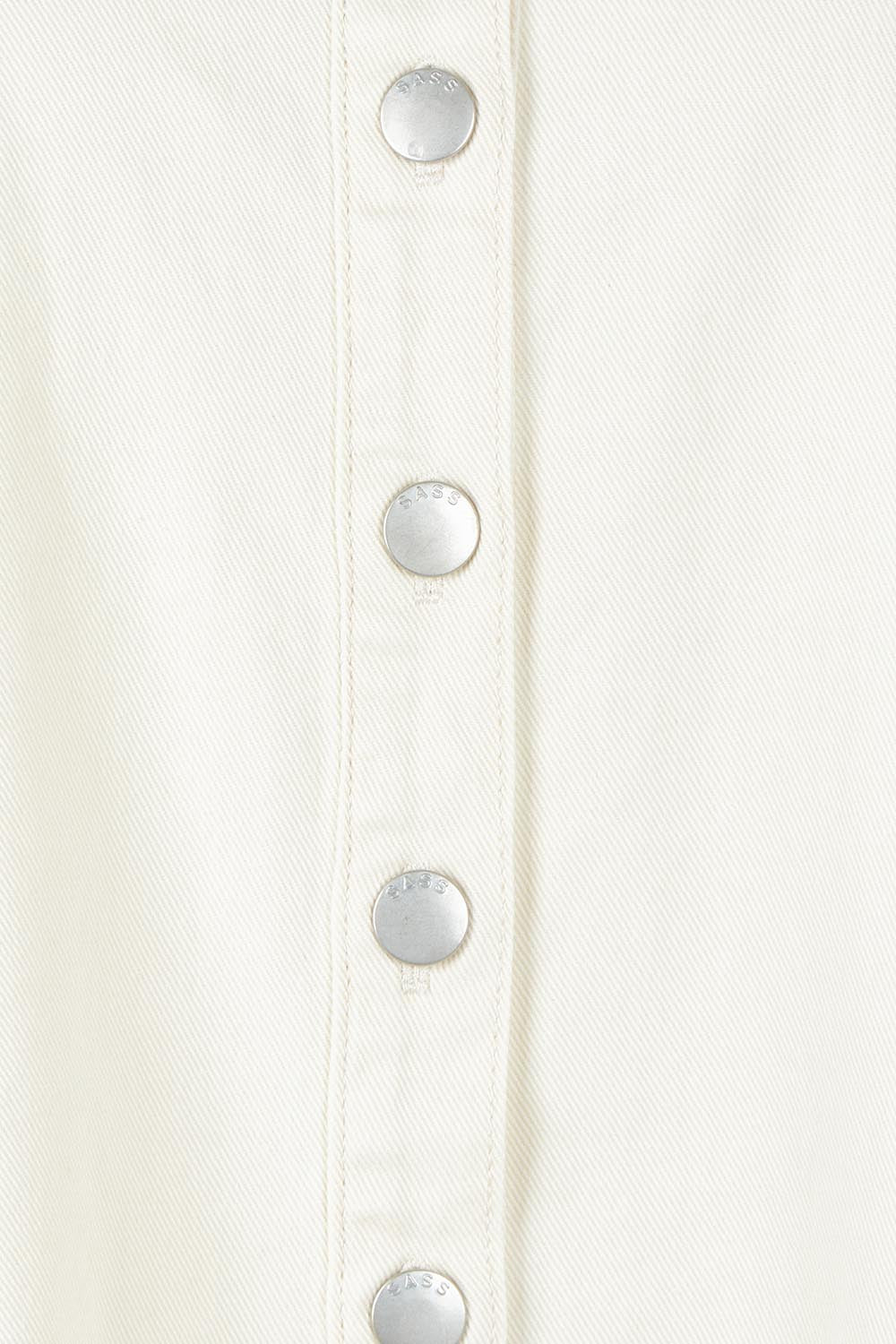 Product shot of the Vale Scalloped Denim Dress in colour Parchment (White), detail