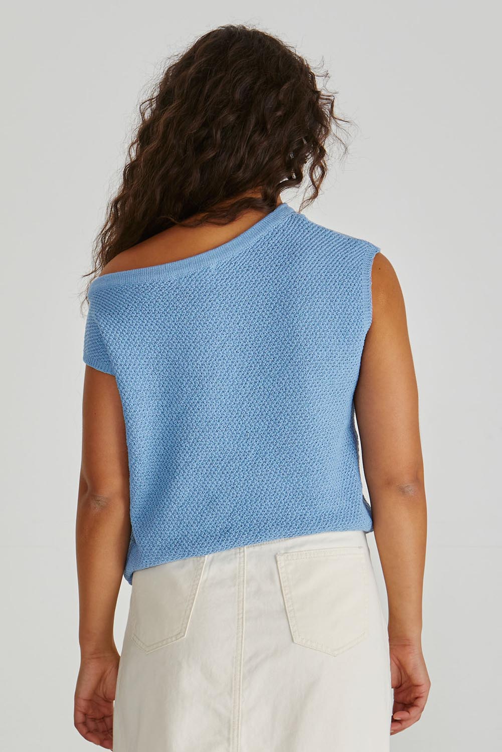 A model wearing the Jaci Cotton Blend Knit Top in colour Blue (Blue), from the back