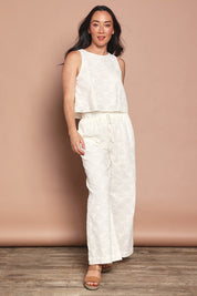 Model Katie wearing size 10 of the Zimmy Broderie Cotton Tank in colour Cream (White), from the front, showing the whole outfit