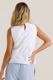 A model wearing the Elin Gathered Tie Top in colour White (White), from the back