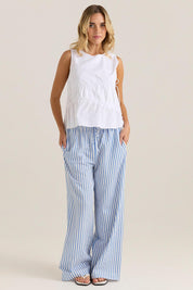 A model wearing the Elin Gathered Tie Top in colour White (White), from the front, showing the whole outfit